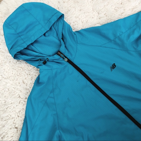 New Balance Jackets & Blazers - NEW BALANCE rain jacket in blue size medium